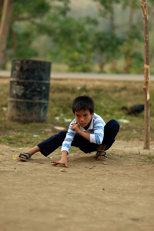 Laos - Luang Prabang - Hmong Boys Playing Marbles